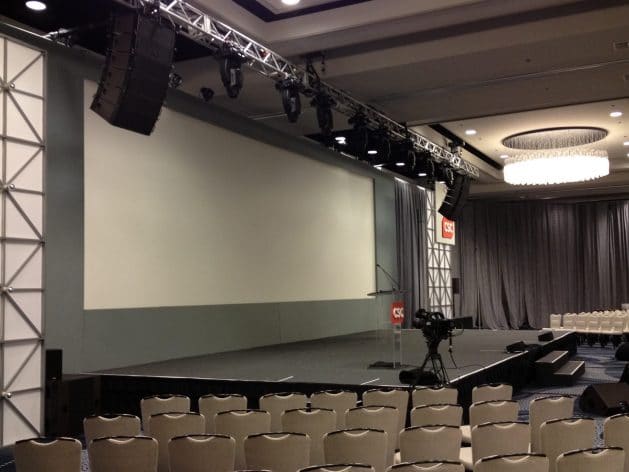 stage with large screen behind it